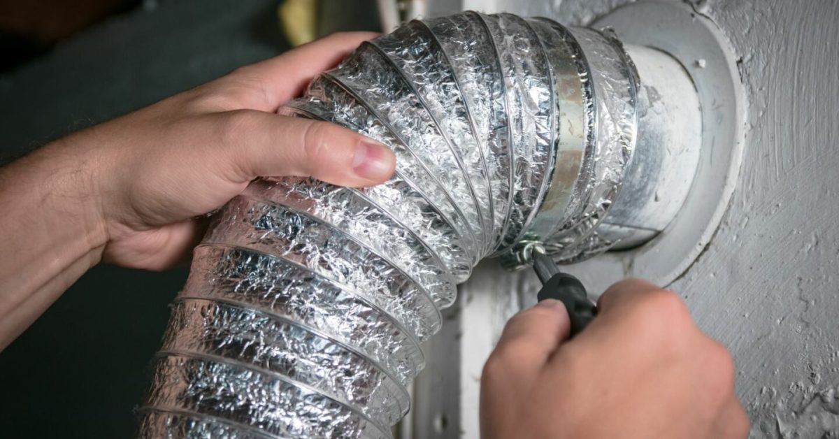 Someone installs an dryer vent hose for a homeowner who found the answer to the question, "What is the best type of dryer vent hose?"