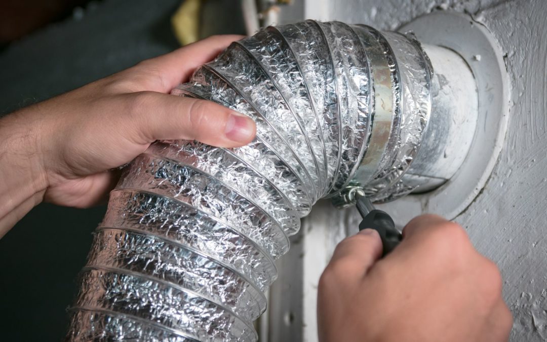 Someone installs an dryer vent hose for a homeowner who found the answer to the question, "What is the best type of dryer vent hose?"