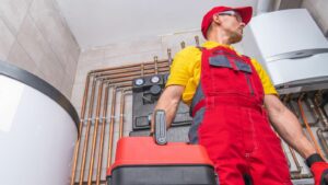 An expert performs HVAC system maintenance