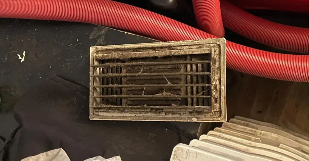 dirty air duct vent cover being cleaned and after repaired