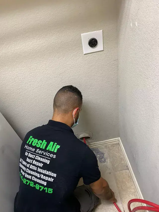 our technician cleaning dryer vent in round rock texas