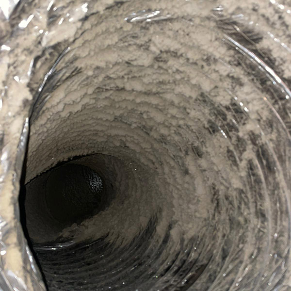dirty air duct before an air duct cleaning